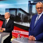 El canciller alemán, el socialdemócrata Olaf Scholz, y el líder conservador, Friedrich Merz