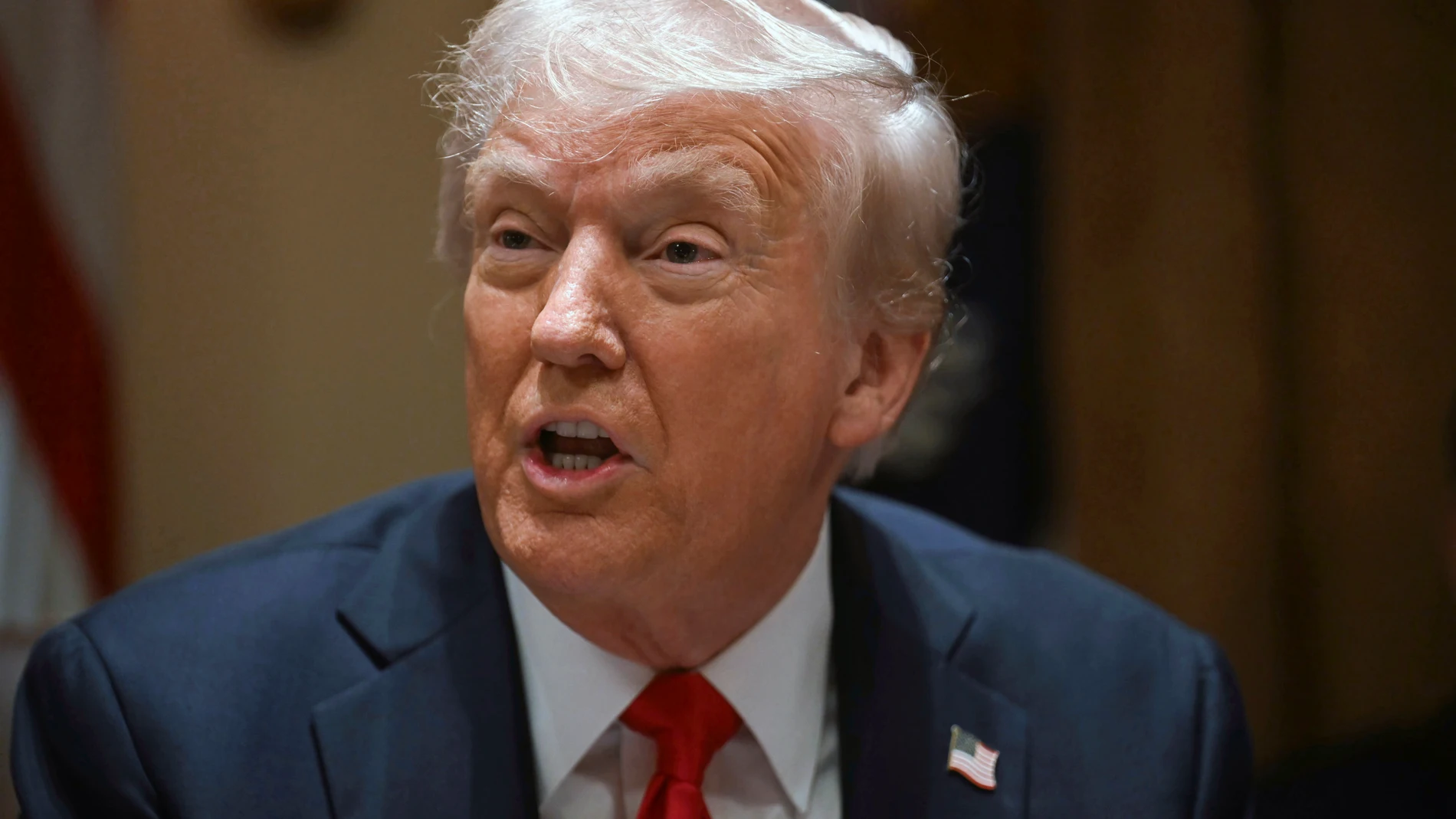 President Donald Trump holds his first Cabinet meeting at the White House in Washington, Wednesday, Feb. 26, 2025. (Pool via AP)