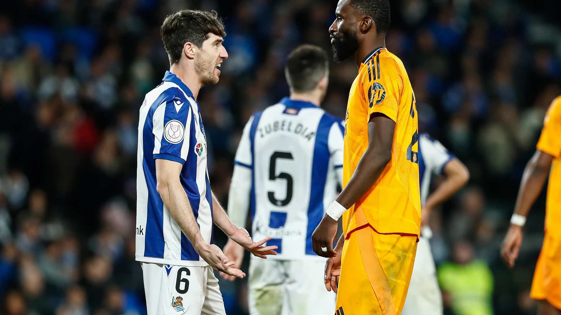 Aritz Elustondo of Real Sociedad protests to Antonio Rudiger of Real Madrid during the Spanish Cup, Copa del Rey, semi-final football match played between Real Sociedad and Real Madrid at Reale Arena stadium on February 26, 2025 in San Sebastian, Spain.AFP7 26/02/2025 ONLY FOR USE IN SPAIN