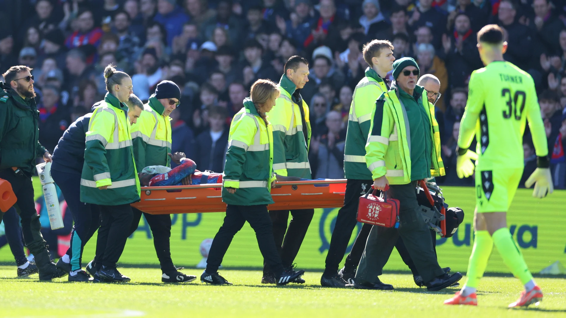 Crystal Palace's Jean-Philippe Mateta is substituted off on a stretcher during the English FA Cup soccer match between Crystal Palace and Millwall at Selhurst Park, London, England, Saturday, March 1, 2025. (AP Photo/Ian Walton)
