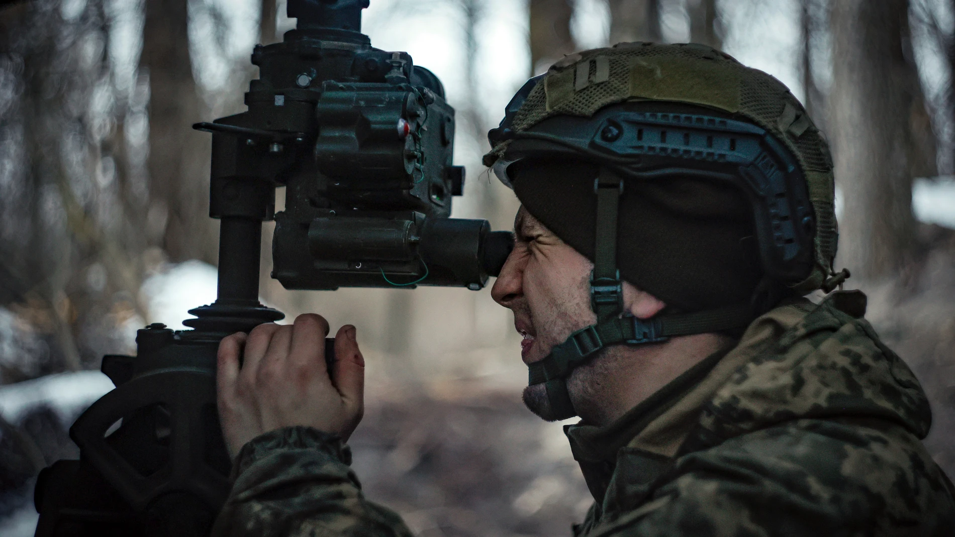 A Ukrainian serviceman prepares to fire a M777 howitzer towards Russian positions at the frontline near Donetsk, Ukraine, Monday, March 3, 2025. (AP Photo/Roman Chop)