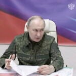Russian President Putin visits military headquarters in the Kursk region