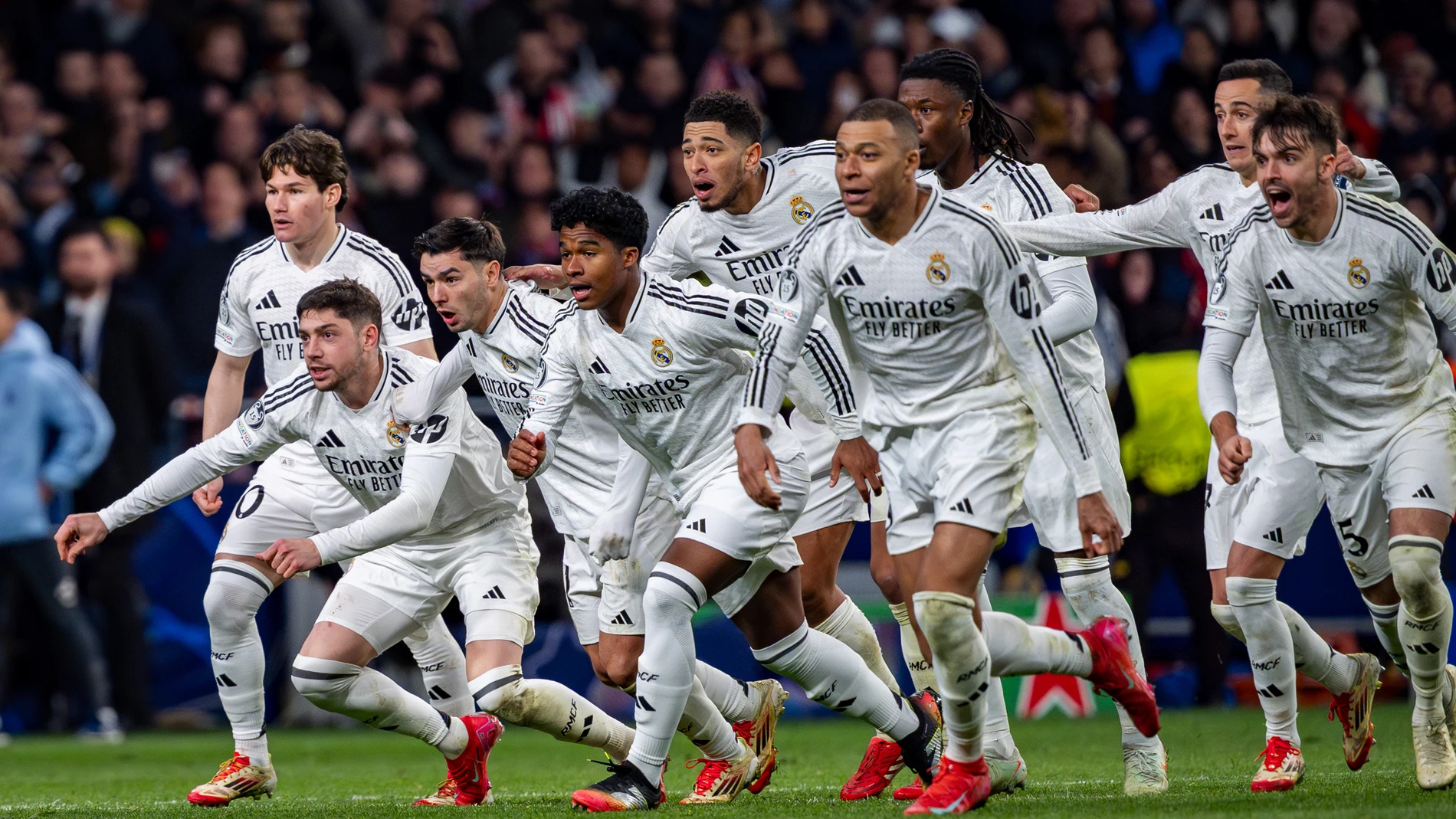 12 March 2025, Spain, Madrid: (L-R) Real Madrid players Fran Garcia, Federico Valverde, Brahim Diaz, Jude Bellingham, Eduardo Camavinga, Endrick Felipe Moreira de Sousa, Lucas Vazquez, Raul Asencio, Kylian Mbappe celebrate winning the penalty shootouts following the UEFA Champions League Round of 16 second leg soccer match between Atletico Madrid and Real Madrid at Estadio Riyadh Air Metropolitano. Photo: Alberto Gardin/ZUMA Press Wire/dpa Alberto Gardin/ZUMA Press Wire/d / DPA 12/03/2025 O...