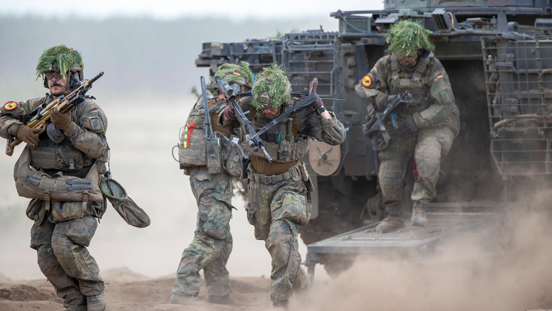 FILE - German soldiers take part in the Lithuanian-German division-level international military exercise 'Grand Quadriga 2024' at a training range in Pabrade, north of the capital Vilnius, Lithuania on May 29, 2024. (AP Photo/Mindaugas Kulbis, File)