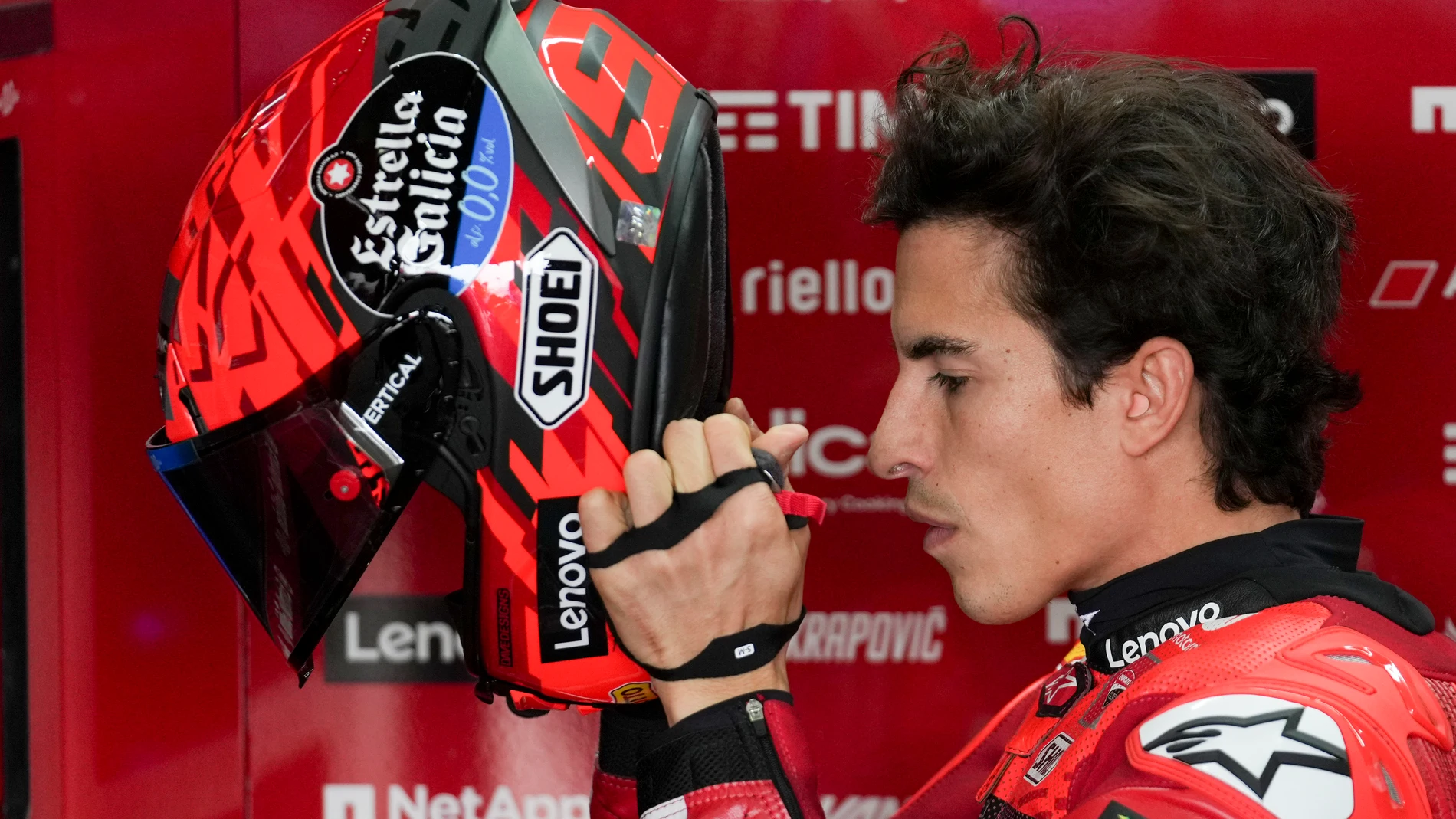 Spain's Marc Marquez of Ducati Lenovo Team puts his helmet on during a MotoGP training session in Termas de Rio Hondo, Argentina, Friday, March 14, 2025. (AP Photo/Gustavo Garello)