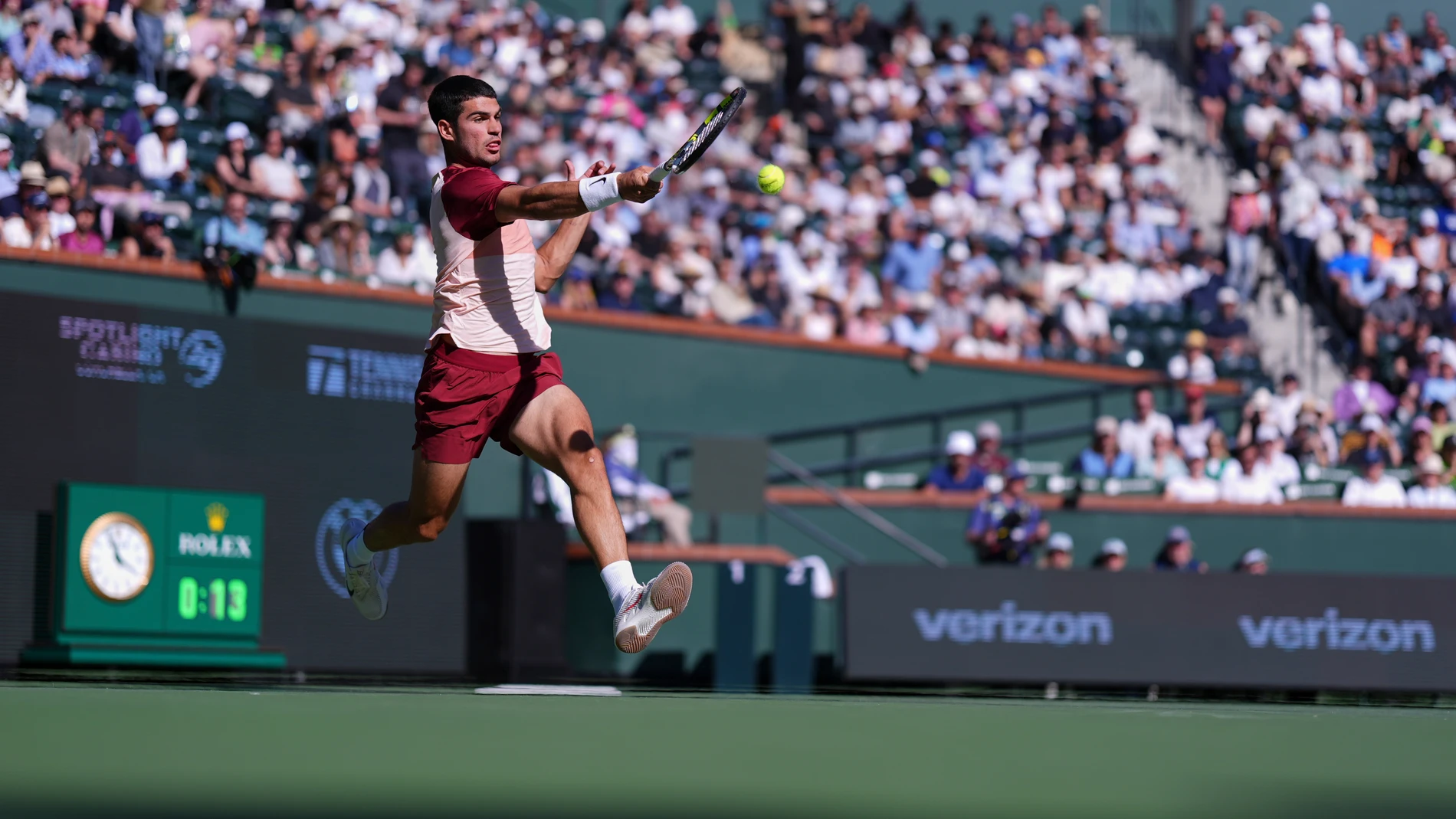 Carlos Alcaraz, of Spain, returns to Jack Draper, of Great Britain, during their semifinals match at the BNP Paribas Open tennis tournament Saturday, March 15, 2025, in Indian Wells, Calif. (AP Photo/Mark J. Terrill)
