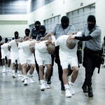 Alleged members of the criminal gang Tren de Aragua arrive in El Salvador