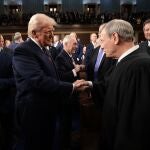 US President Donald Trump (L) greets United States Supreme Court Chief Justice John G. Roberts, Jr. as he arrives to address to a joint session of the United States Congress at theÂ US Capitol in Washington, DC, USA, on 04 March 2025. 