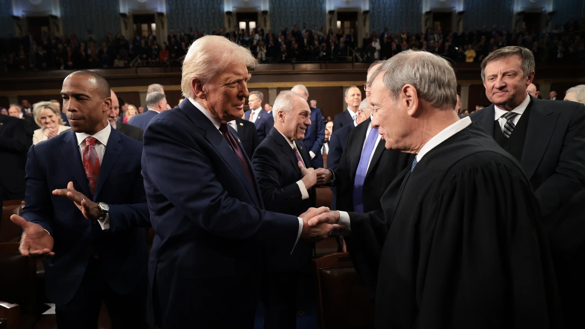 US President Donald Trump (L) greets United States Supreme Court Chief Justice John G. Roberts, Jr. as he arrives to address to a joint session of the United States Congress at the US Capitol in Washington, DC, USA, on 04 March 2025.