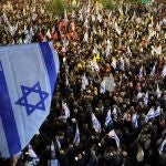 Demonstrators gather outside Israeli Defence Ministry headquarters Tel Aviv on March 22, 2025 during an anti-government protest calling for action to secure the release of Israeli hostages held captive in the Gaza Strip since the October 7 attacks by Palestinian militants.