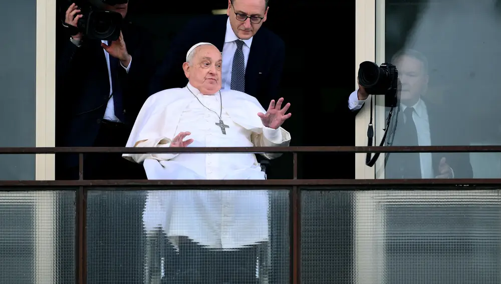 Pope Francis blesses the faithful from the balcony of the Gemelli hospital