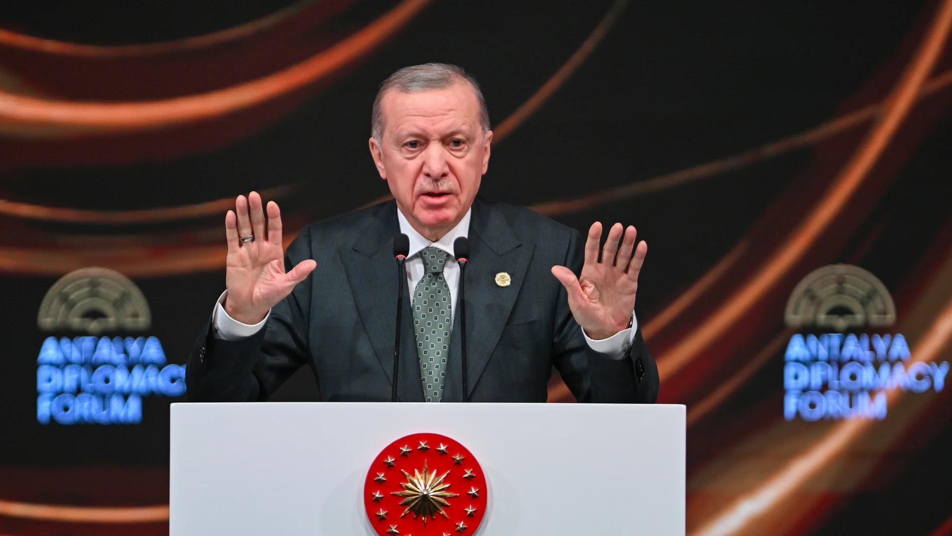 Turkish President Recep Tayyip Erdogan gives a speech during the opening ceremony of the Antalya Diplomacy Forum in Antalya, Turkey, Friday, April 11, 2025. (Mert Gokhan Koc/Dia Photo via AP)
