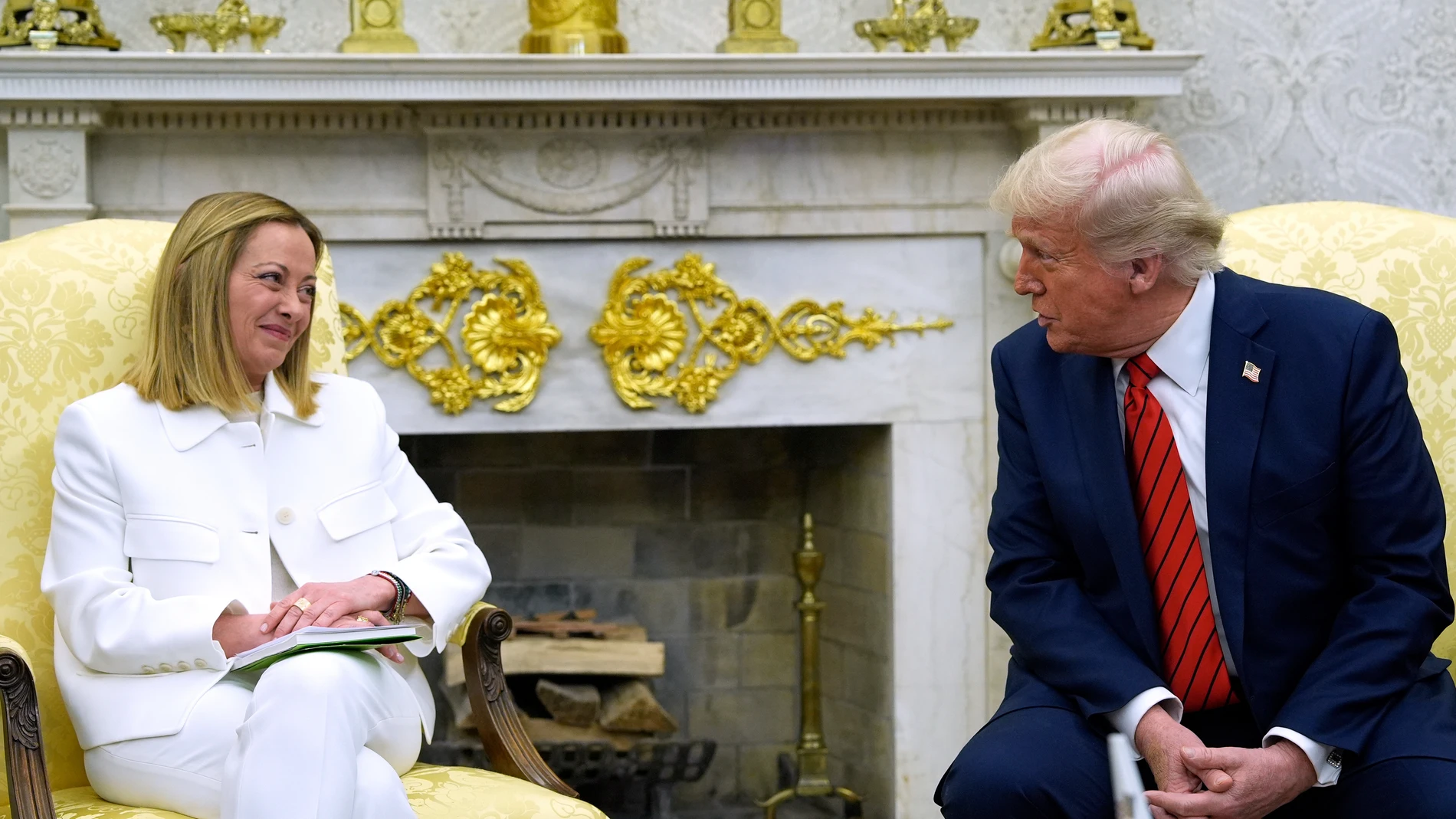 President Donald Trump meets with Italian Prime Minister Giorgia Meloni in the Oval Office of the White House, Thursday, April 17, 2025, in Washington. (AP Photo/Alex Brandon)