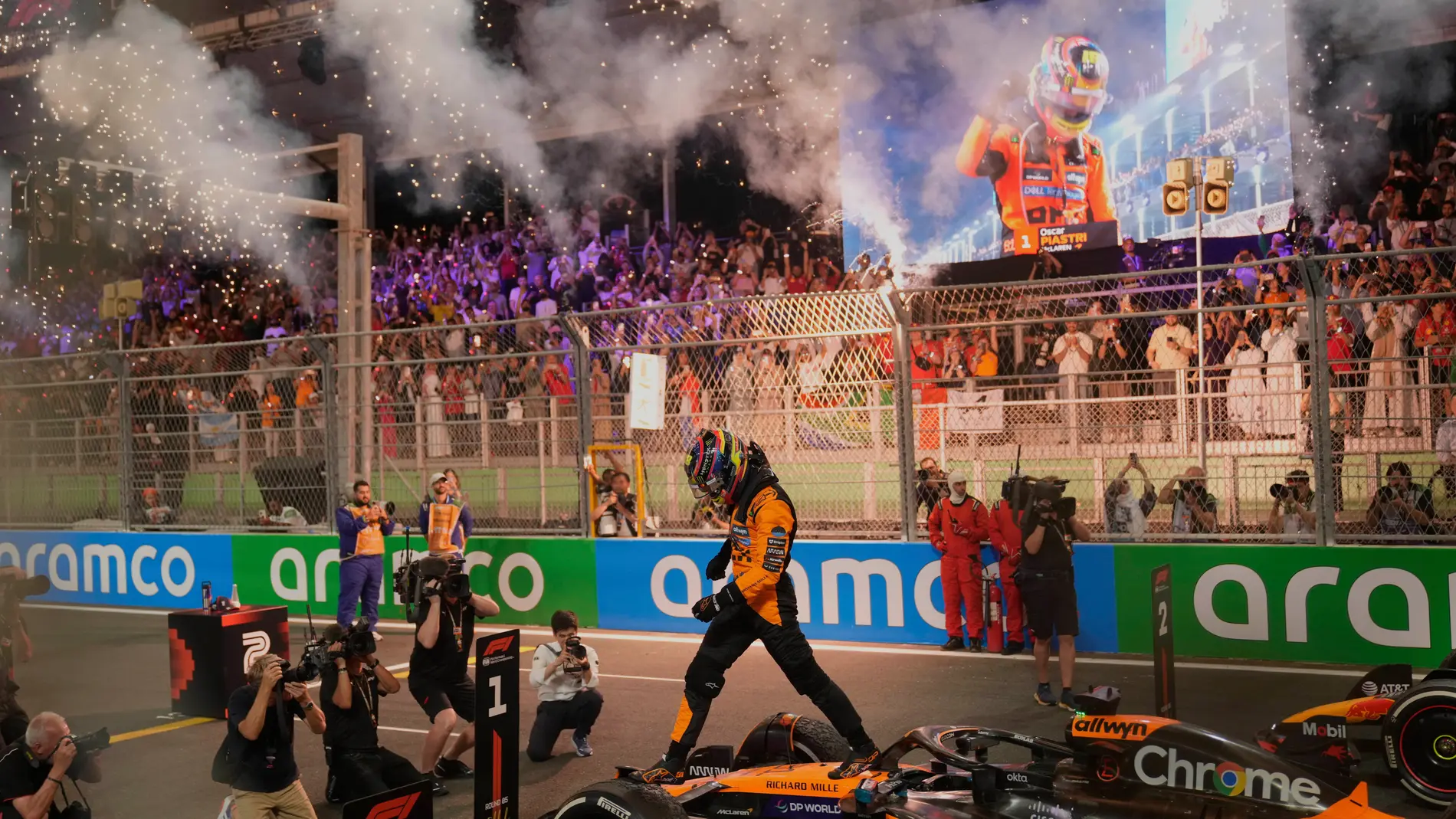 McLaren driver Oscar Piastri of Australia celebrates after winning the Formula One Saudi Arabian Grand Prix at the Jeddah Corniche Circuit in Jeddah, Saudi Arabia, Sunday, April 20, 2025. (AP Photo/Darko Bandic)