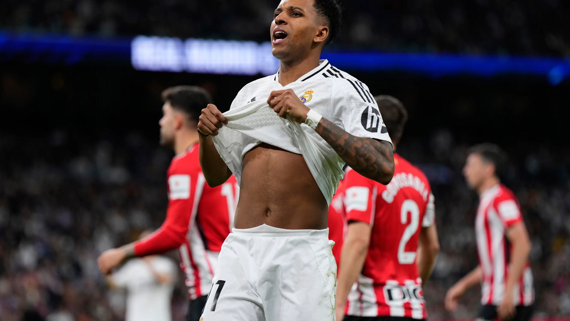 Real Madrid's Rodrygo reacts after missing a chance to score during the Spanish La Liga soccer match between Real Madrid and Athletic Bilbao at the Santiago Bernabeu stadium in Madrid, Sunday, April 20, 2025. (AP Photo/Manu Fernandez)