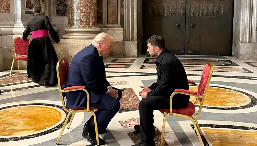 In this handout photograph taken and released by the Ukrainian Presidential Press Service on April 26, 2025, Ukraine's President Volodymyr Zelensky (R) meets with US President Donald Trump (L) on the sidelines of Pope Francis's funeral at St. Peter's Basilica at the Vatican. (Photo by Handout / UKRAINIAN PRESIDENTIAL PRESS SERVICE / AFP)