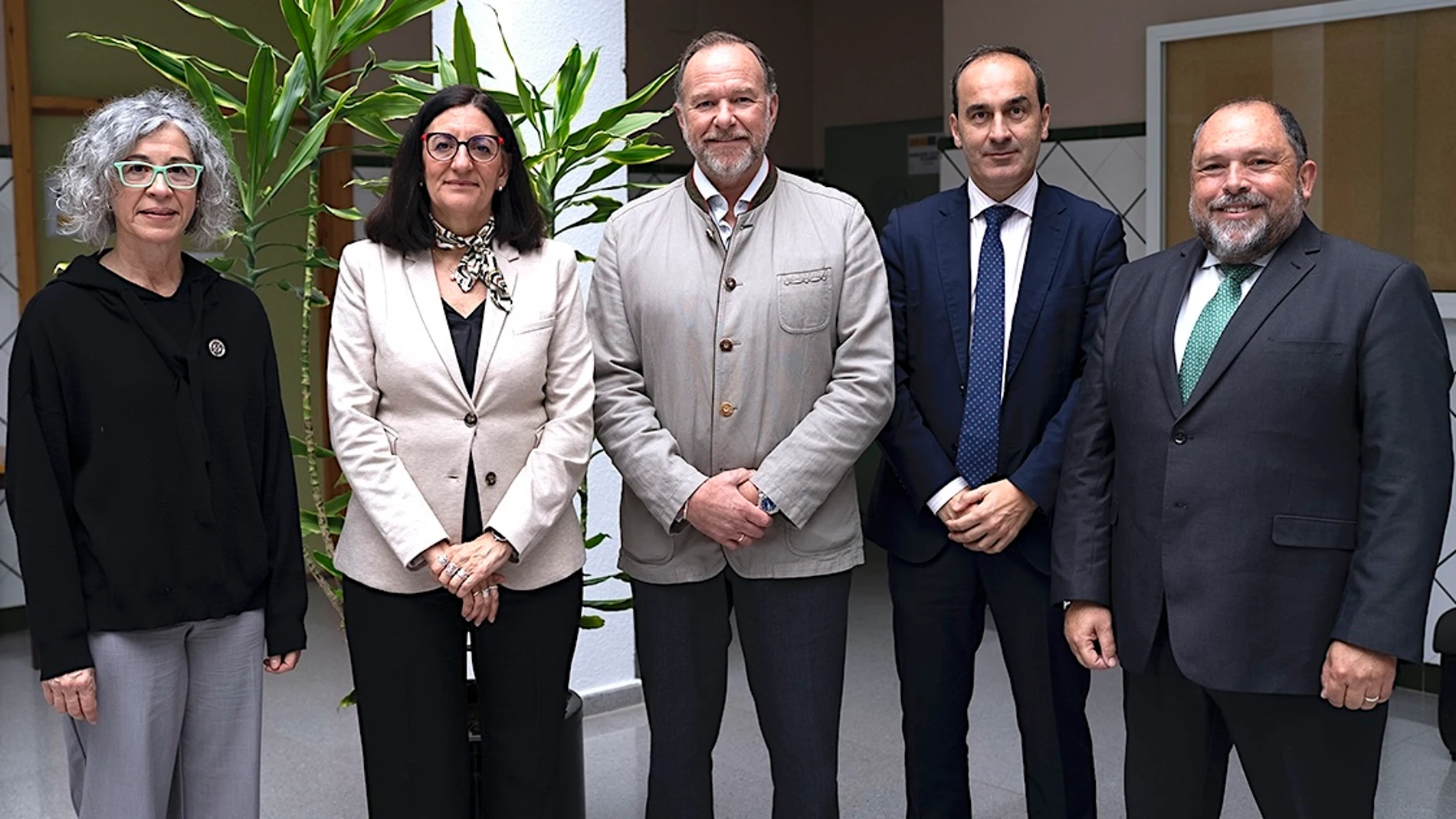 Los representantes de la Universidad de Huelva y de Caja Rural del Sur
