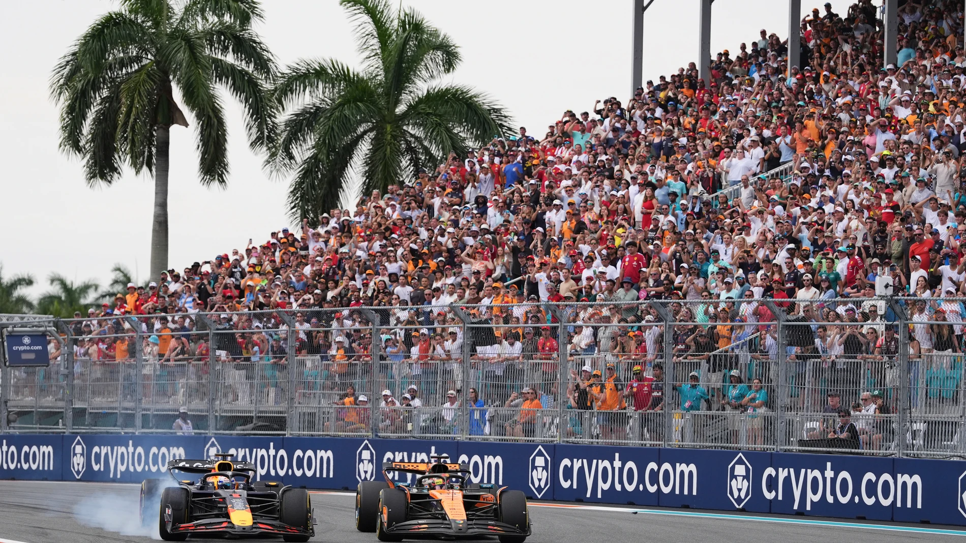 Red Bull driver Max Verstappen of the Netherlands, left, races next to McLaren driver Oscar Piastri of Australia during the Formula One Miami Grand Prix auto race Sunday, May 4, 2025, in Miami Gardens. Fla. (AP Photo/Rebecca Blackwell)