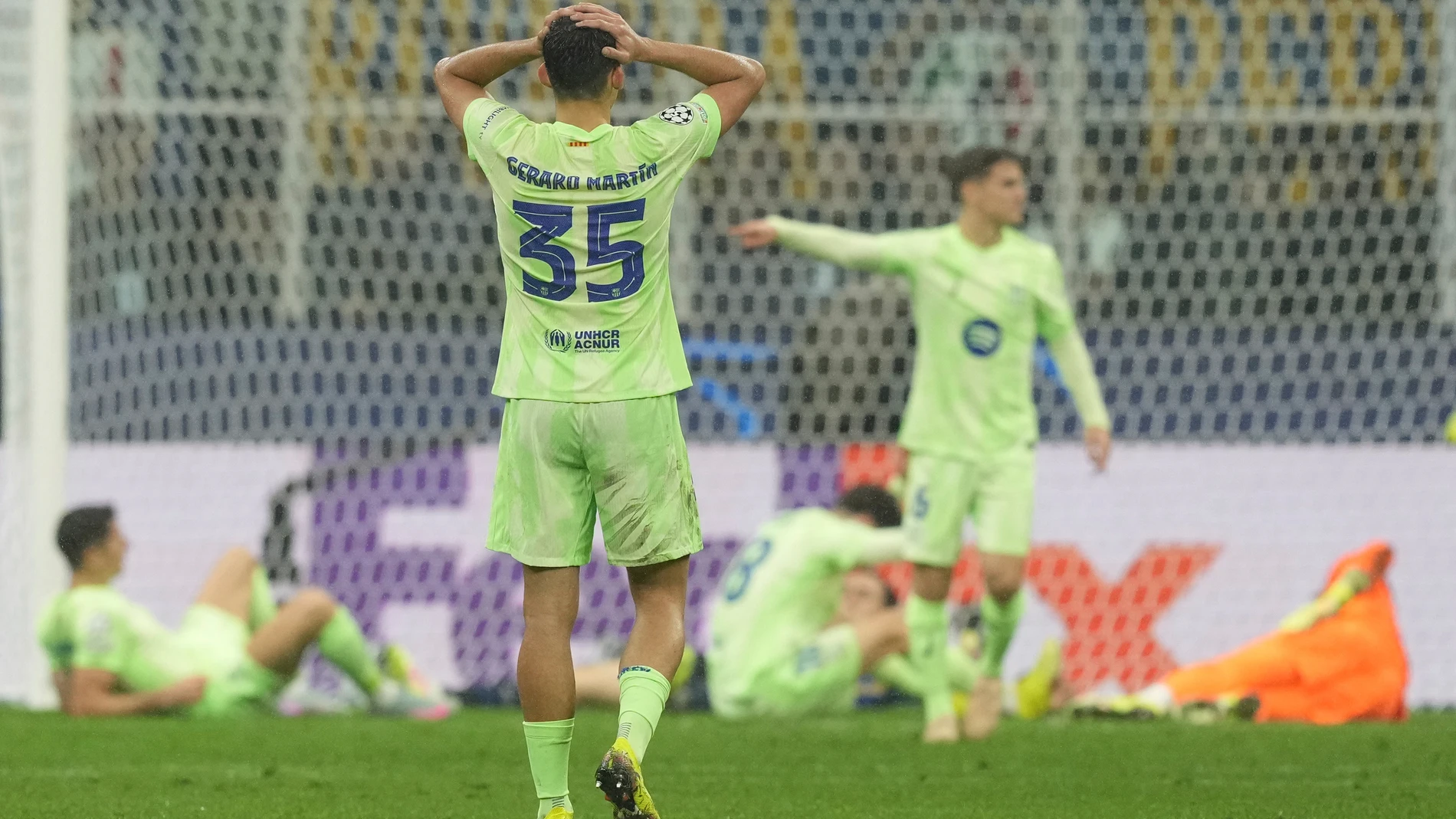 Barcelona's Gerard Martín reacts during the Champions League semifinal second leg soccer match between Inter Milan and Barcelona at San Siro stadium in Milan , Italy, Tuesday, May 6, 2025. (AP Photo/Antonio Calanni)