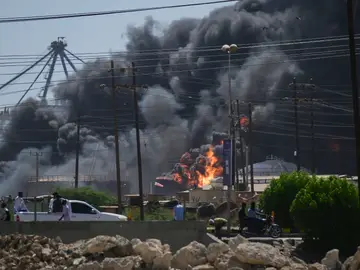 Sudan Smoke billows after drone strikes by the paramilitary Rapid Support Forces (RSF) targeted the northern port in the Red Sea city of Port Sudan, Sudan, Tuesday, May 6, 2025. (AP Photo)