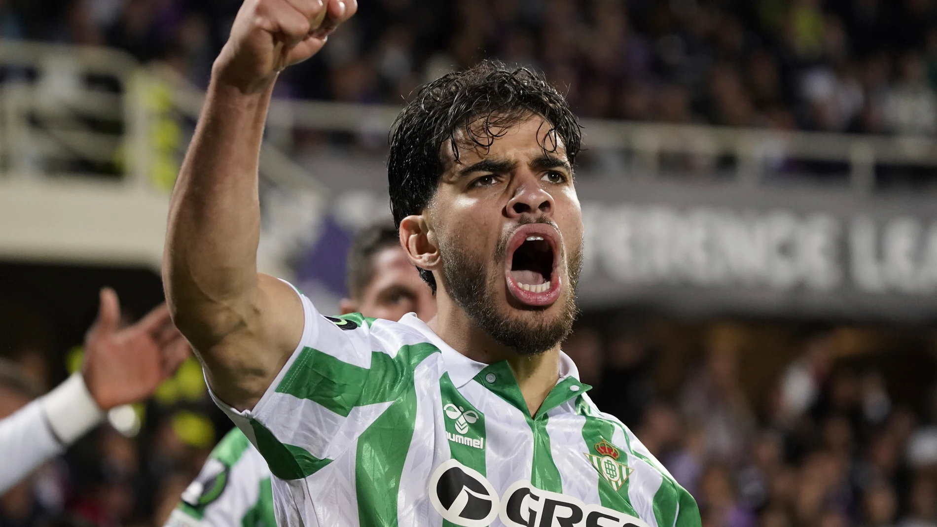 Betis' Abde Ezzalzuoli celebrates after scoring their second goal of the game during the UEFA Conference League second leg semifinal soccer match between Fiorentina and Real Betis at Artemio Franchi stadium in Florence, Italy, Thursday, May 8, 2025. (Marco Bucco/LaPresse via AP)