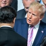 Trump con Xi Jinping en una foto de archivo