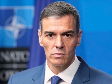 Spain's Prime Minister Pedro Sanchez pauses during a press conference after the plenary session at the NATO summit in The Hague, Netherlands, Wednesday, June 25, 2025. (AP Photo/Markus Schreiber)