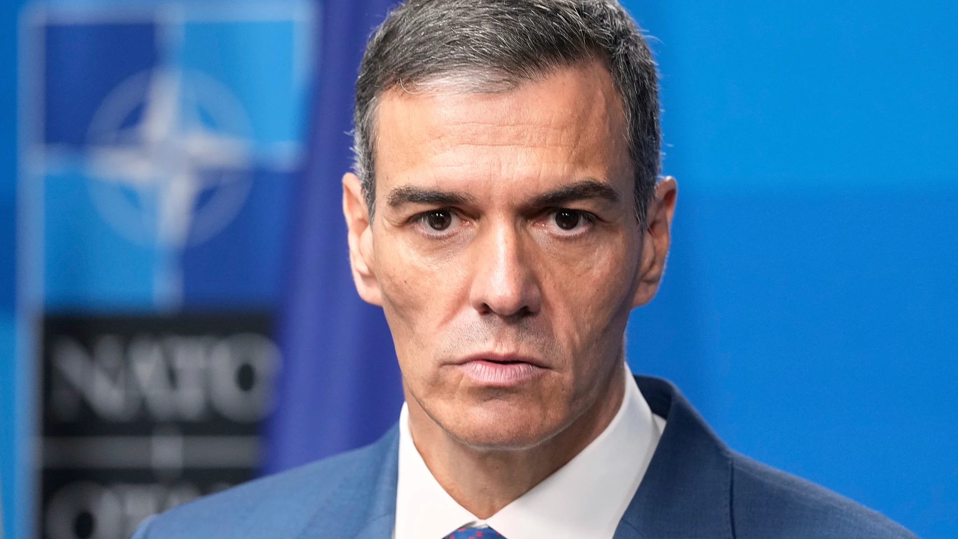 Spain's Prime Minister Pedro Sanchez pauses during a press conference after the plenary session at the NATO summit in The Hague, Netherlands, Wednesday, June 25, 2025. (AP Photo/Markus Schreiber)