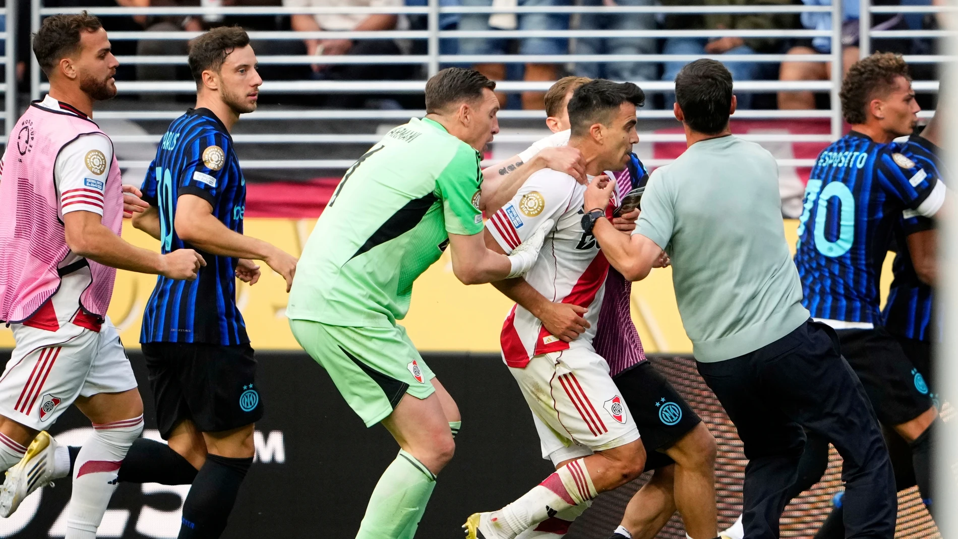 Players scuffle after the Club World Cup Group E soccer match between Inter Milan and River Plate in Seattle, Wednesday, June 25, 2025. (AP Photo/Lindsey Wasson)