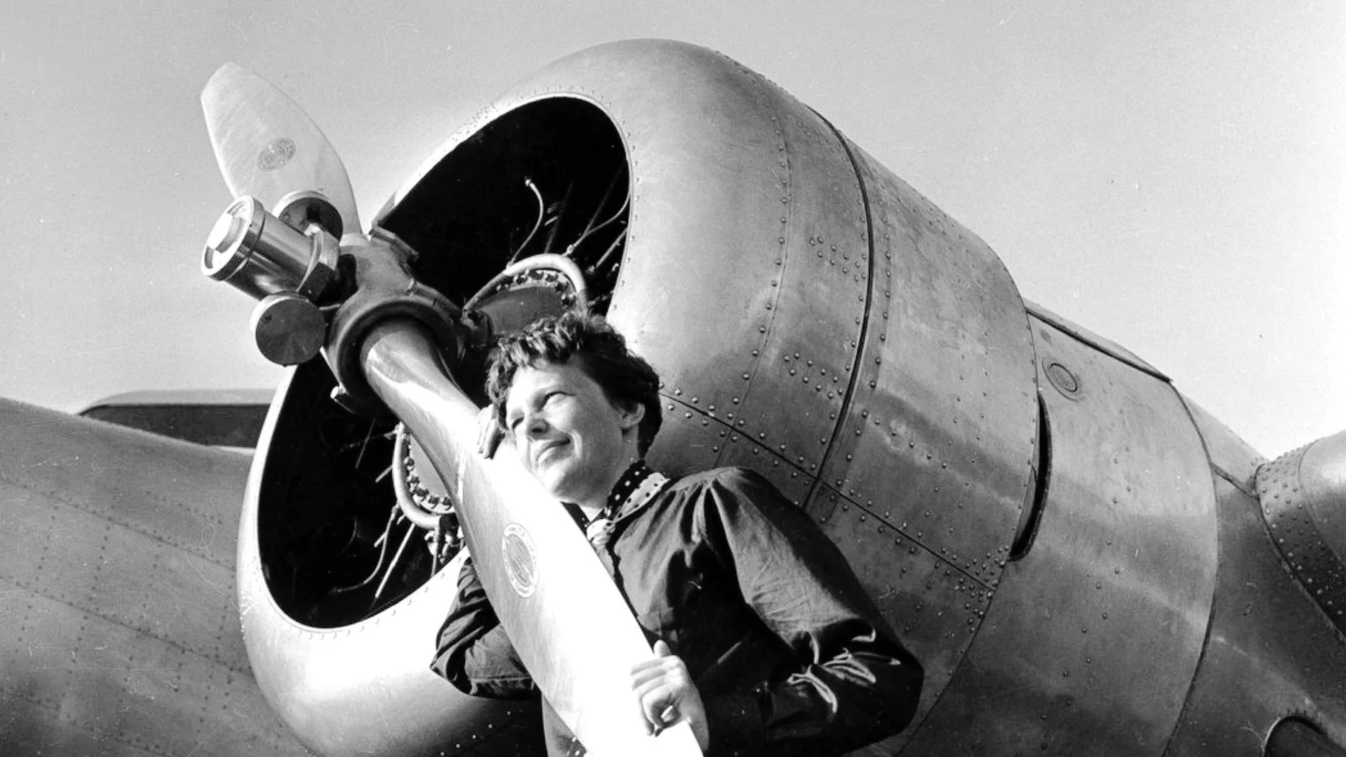 Aviator Amelia Earhart with her Electra plane's propeller, taken by Albert Bresnik at Burbank Airport in Burbank, Calif. It was a clear spring day in 1937