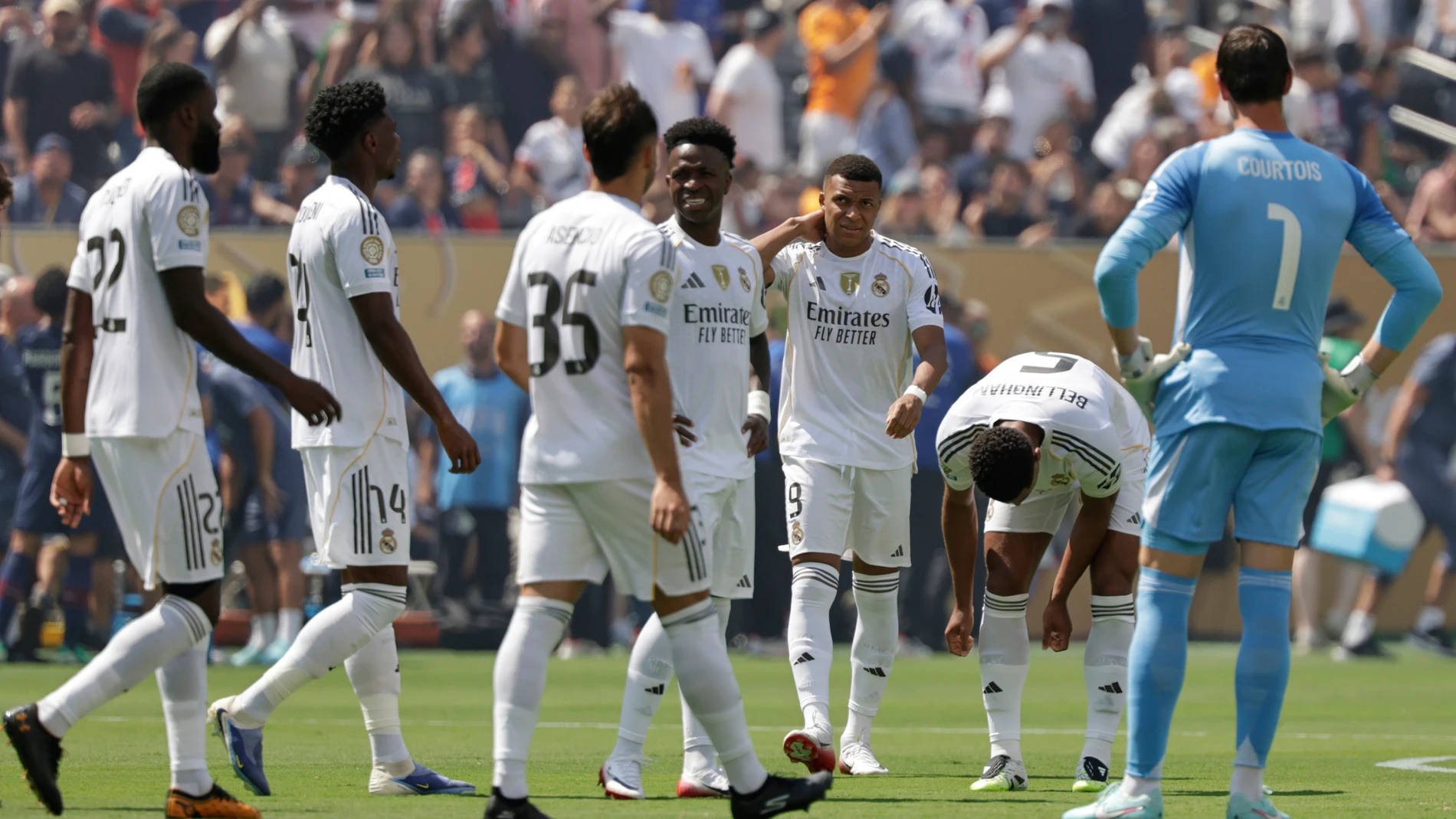 Real Madrid's Kylian Mbappe, background center, arrives for the Club World Cup semifinal soccer match between PSG and Real Madrid in East Rutherford, N.J., Wednesday, July 9, 2025. (AP Photo/Adam Hunger)