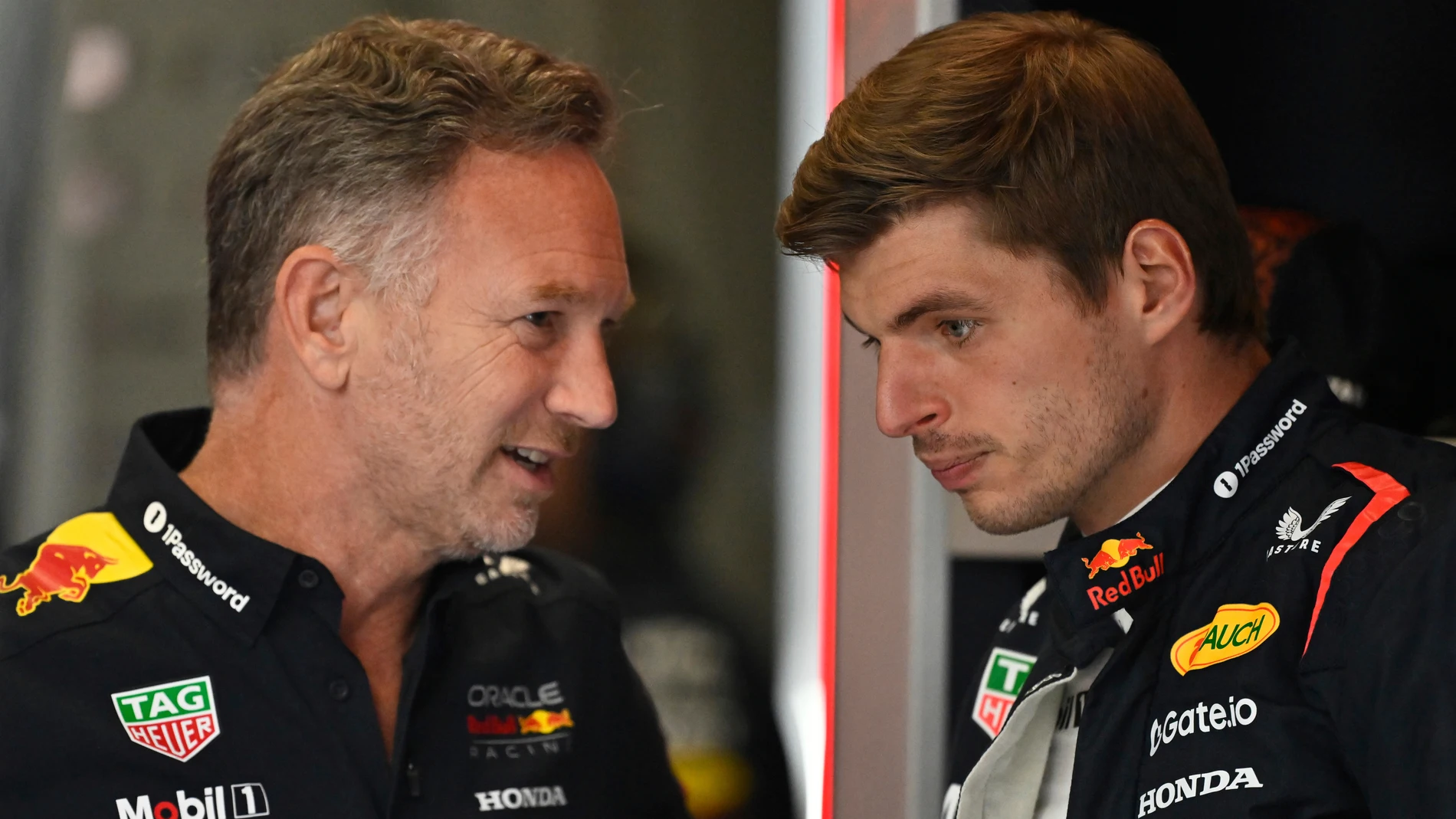 FILE -Red Bull team principal Christian Horner talkks to Red Bull driver Max Verstappen of the Netherlands before the third free practice at the Red Bull Ring racetrack, ahead of the Austrian Formula One Grand Prix in Spielberg, Austria, Saturday, June 28, 2025. (AP Photo/Denes Erdos), File)