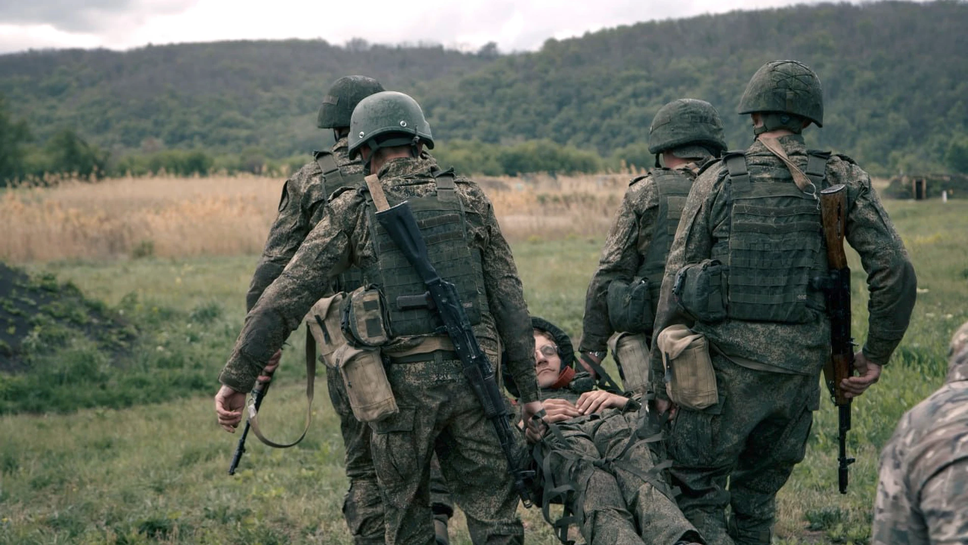 In this photo taken from video distributed by Russian Defense Ministry Press Service on Wednesday, July 9, 2025, Russian soldiers attend a tactical medical training at a rear military training ground in an undisclosed location in Ukraine. (Russian Defense Ministry Press Service via AP)