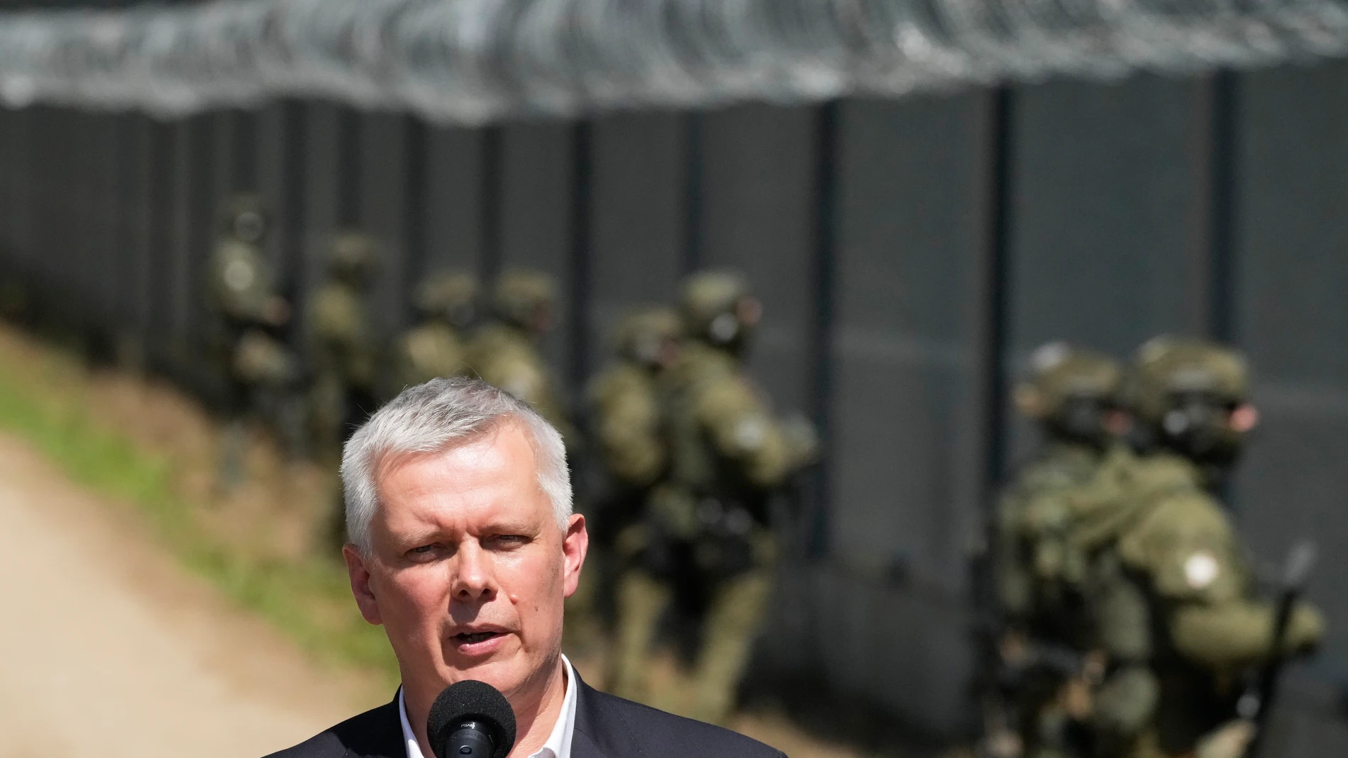 Polish Interior Minister Tomasz Siemoniak makes a statement for the media during a visit with his German counterpart Alexander Dobrindt to the Polish-Belarus border crossing, in Polowce, Poland, Monday, July 21, 2025. (AP Photo/Czarek Sokolowski)