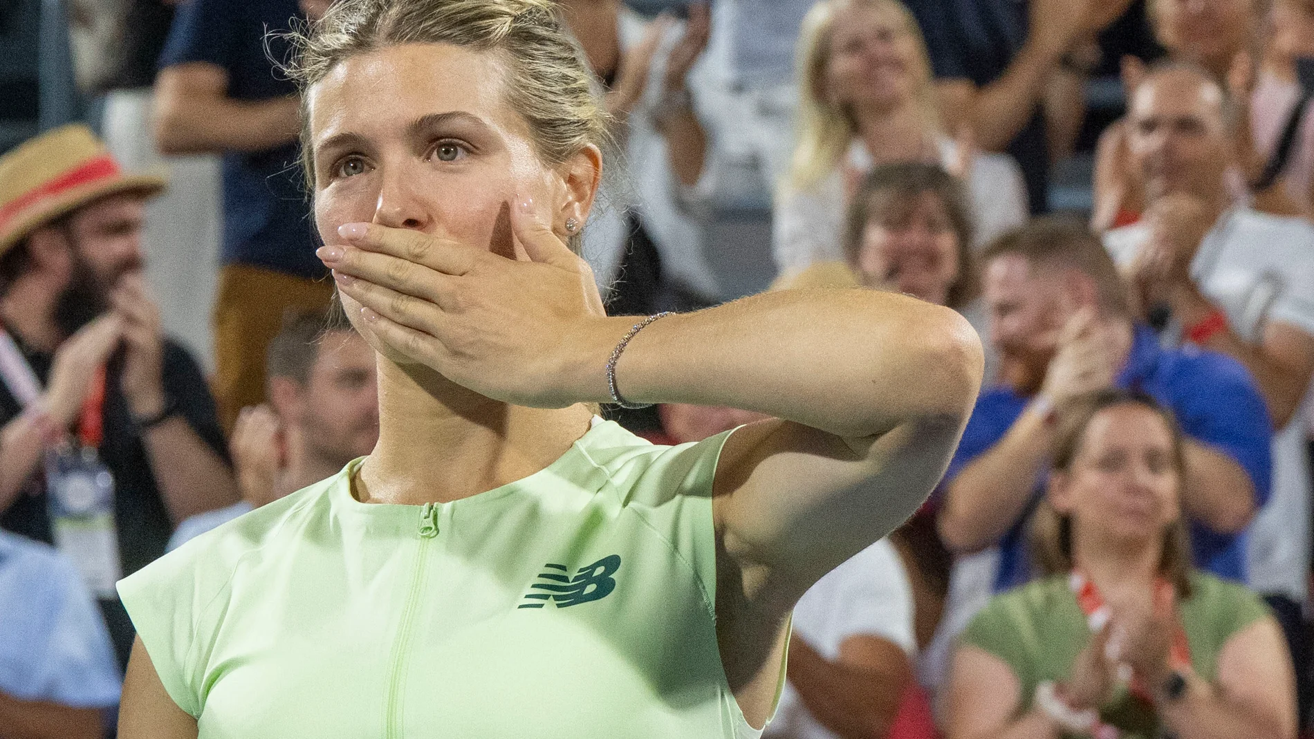 Eugenie Bouchard of Canada blows a kiss to the crowd following her retirement ceremony following second round tennis action at the National Bank Open in Montreal, Wednesday, July 30, 2025. (Christinne Muschi/The Canadian Press via AP)