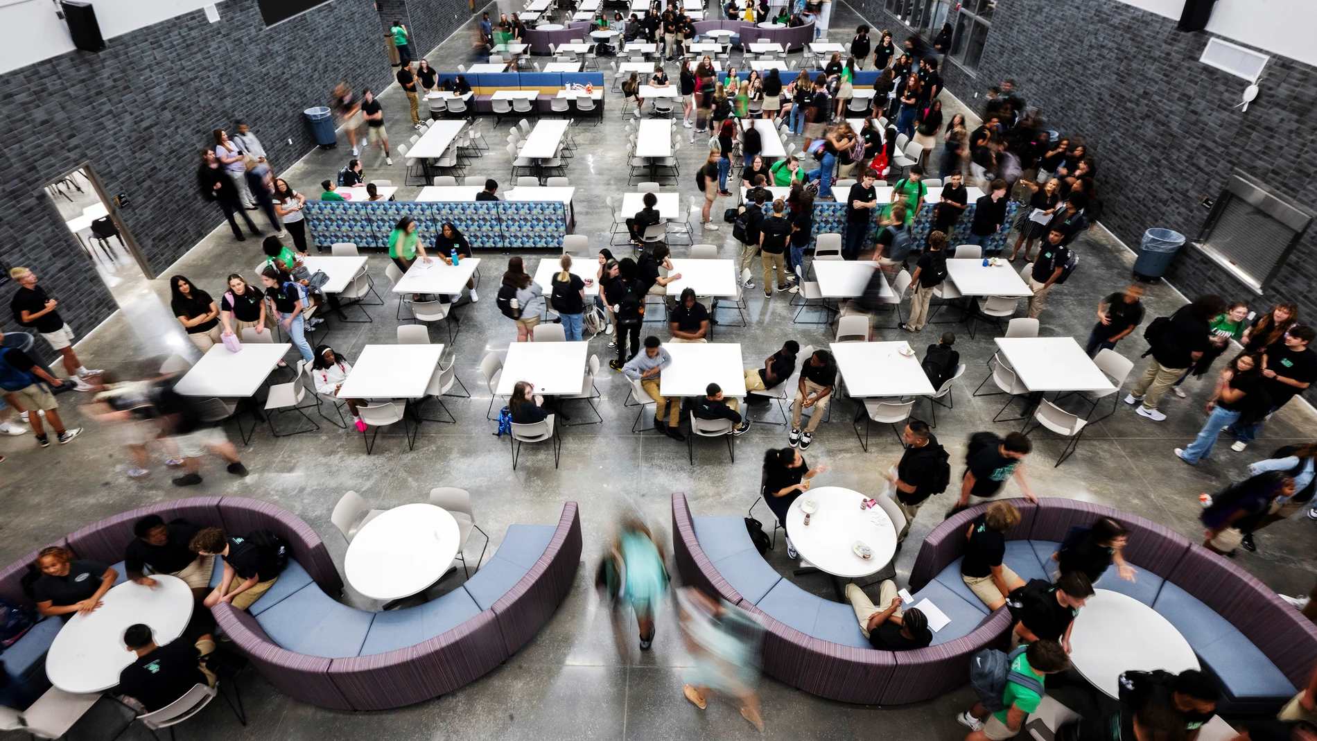 Students and faculty start their school year in the brand new Lafayete High School Thursday, Aug. 7, 2025, in Lafayette, La. (Leslie Westbrook/The Advocate via AP)