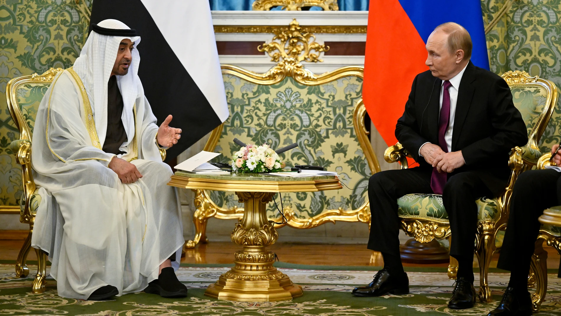 Russian President Vladimir Putin, right, speaks with United Arab Emirates President Sheikh Mohammed bin Zayed Al Nahyan during their meeting at the Grand Kremlin Palace in Moscow, Russia, Thursday, Aug. 7, 2025. (Alexander Nemenov/Pool Photo via AP)