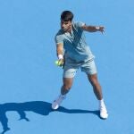 Spanish tennis player Carlos Alcaraz in action against Bosnia's Damir Dzumhur during their men's singles round of 64 of the Cincinnati Open tennis tournament at the Lindner Family Tennis Center.