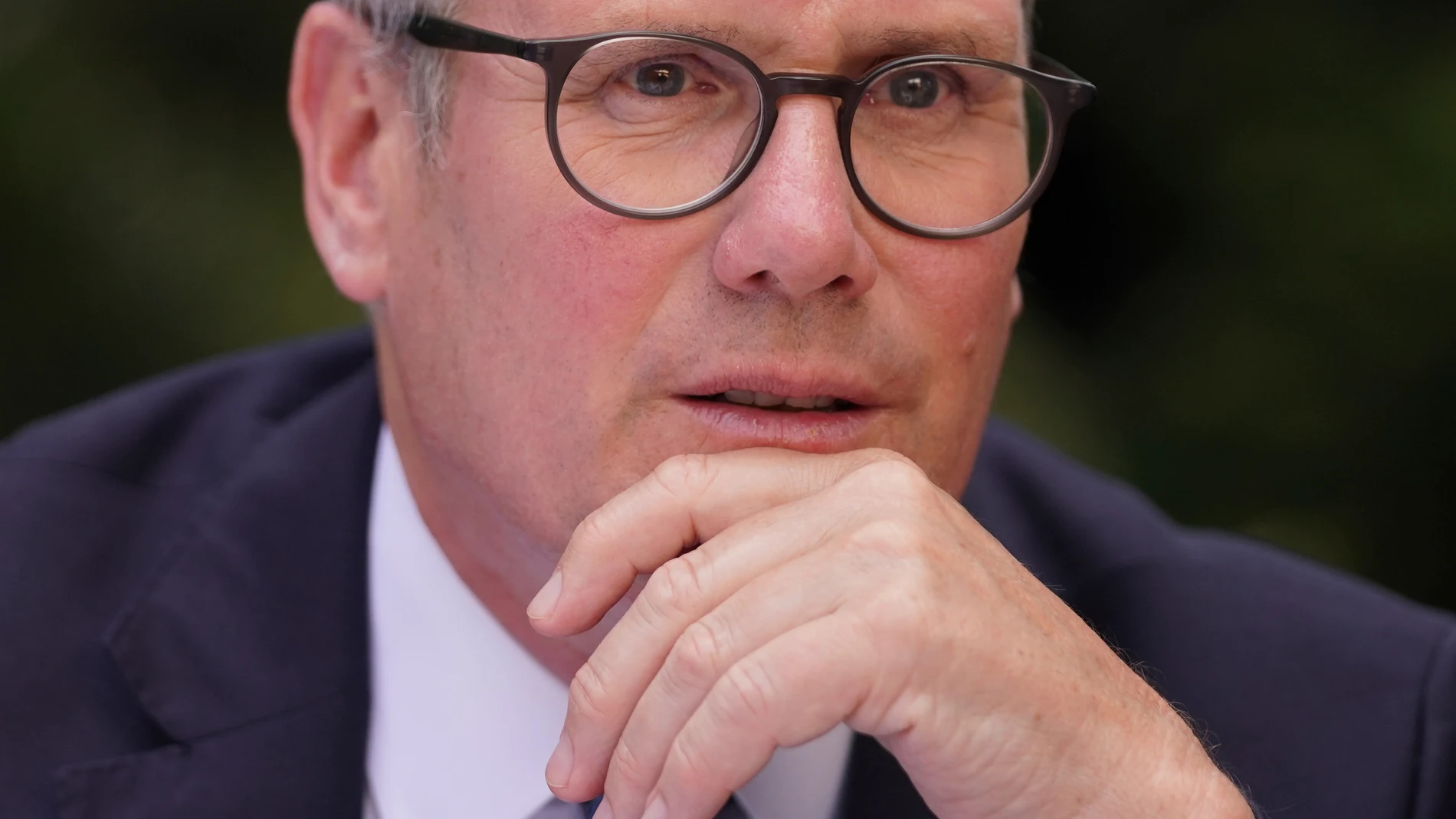 Britain's Prime Minister Keir Starmer attends a VJ Day commemorative reception in the Downing Street garden, London, Thursday, Aug. 14, 2025, bringing together veterans, historians, and school children. (AP Photo/Alberto Pezzali, Pool)