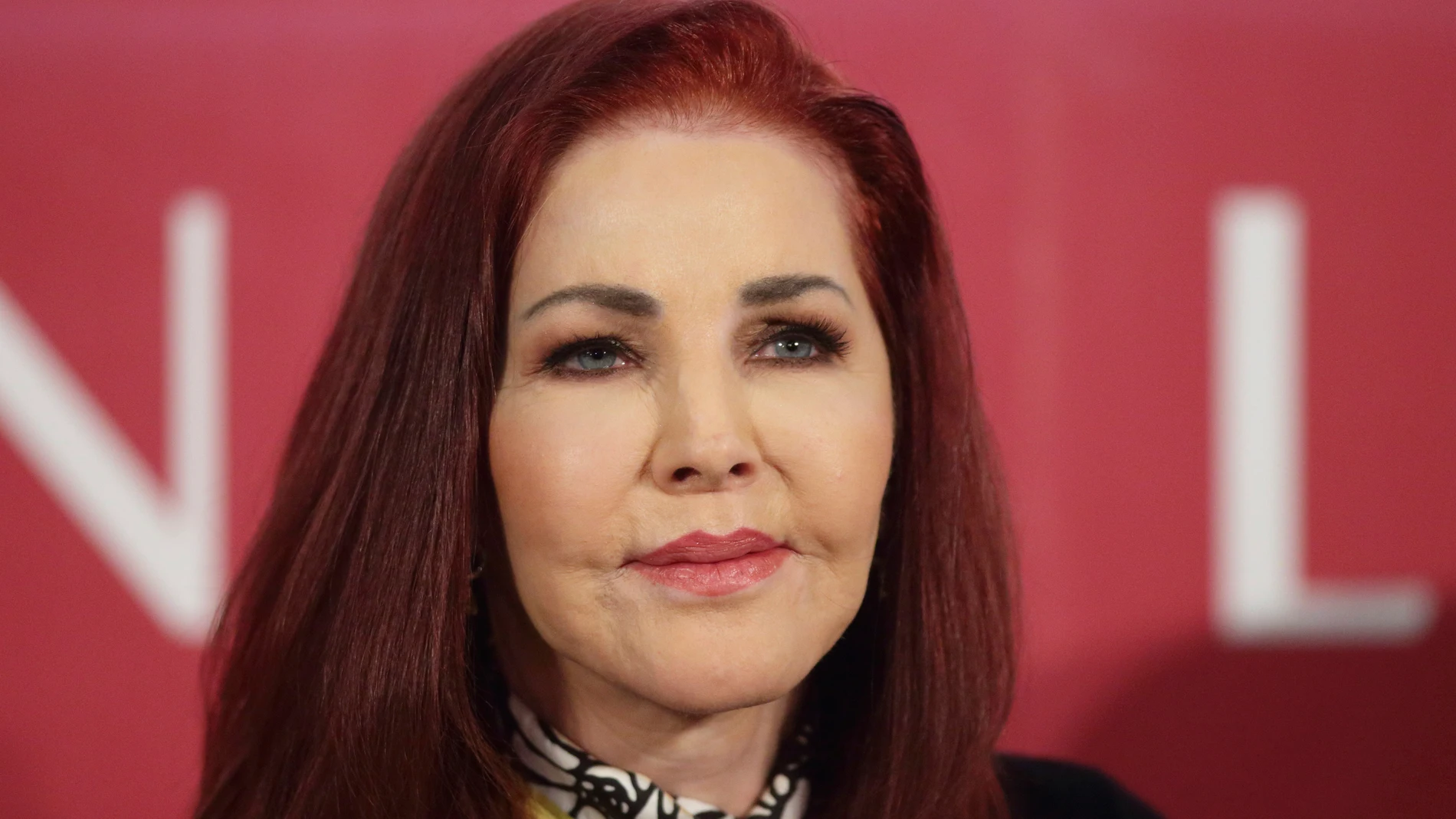 FILE - Priscilla Presley attends a news conference on the Vienna Opera Ball in Vienna, Austria, Feb. 7, 2024. (AP Photo/Heinz-Peter Bader, File)