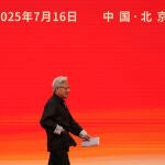 President and CEO of Nvidia Corporation Jensen Huang heads to deliver his speech for the opening ceremony of the 3rd China International Supply Chain Expo in Beijing, Wednesday, July 16, 2025. 