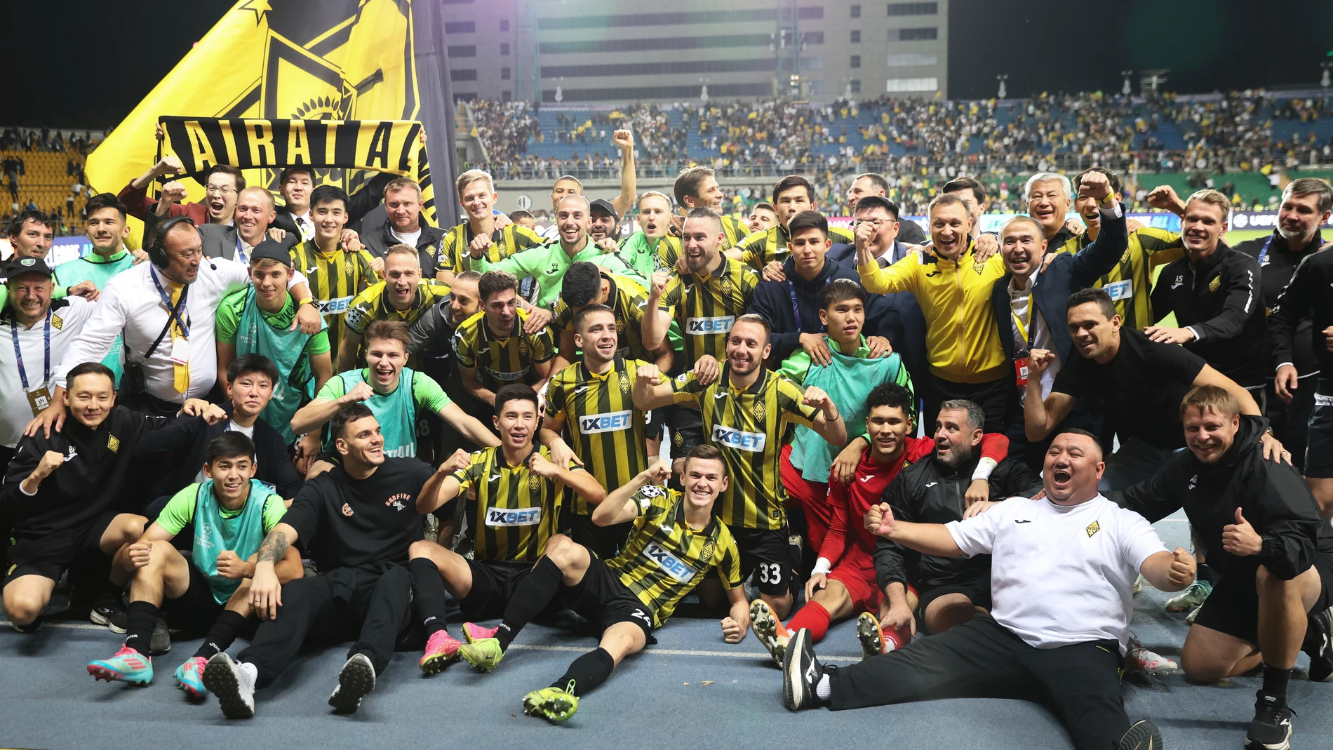 Kairat players celebrate after winning the Champions League playoff second leg soccer match between Kairat and Celtic at Ortalyk stadium in Almaty, Kazakhstan, Wednesday, Aug. 27, 2025. (AP Photo/Alikhan Sariyev)