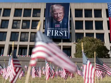 Trump District of Columbia A portrait of President Donald Trump hangs on the Labor Department headquarters near the Capitol in Washington, Friday, Aug. 29, 2025. (AP Photo/Jose Luis Magana)