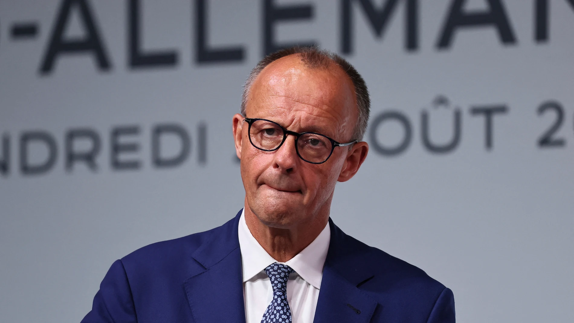 German Chancellor Friedrich Merz attends a joint news conference with French President Emmanuel Macron after a Franco-German cabinet meeting and a meeting of the Franco-German Defense and Security Council (CFADS) in Toulon, southern France, Friday Aug. 29, 2025. (Manon Cruz/Pool via AP)