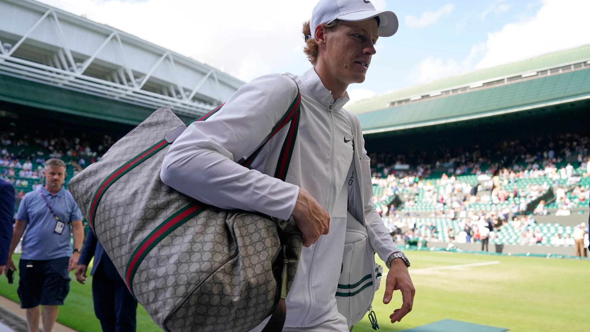 FILE - Italy's Jannik Sinner walks off court after defeating Colombia's Daniel Elahi Galan in the men's singles match on day seven of the Wimbledon tennis championships in London, July 9, 2023. (AP Photo/Alberto Pezzali, File)