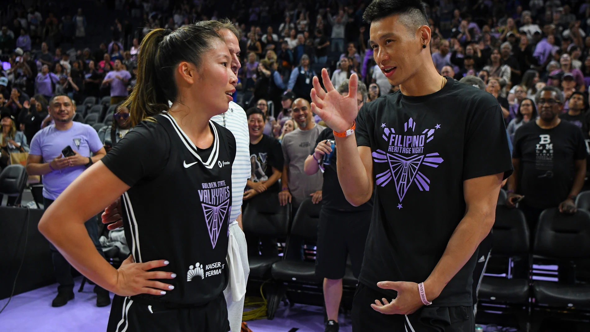 Golden State Valkyrie's Kaitlyn Chen chats with former NBA player Jeremy Lin after a WNBA basketball game against the Washington Mystics at Chase Center in San Francisco, Saturday, Aug. 30, 2025. (Jose Carlos Fajardo/Bay Area News Group via AP)