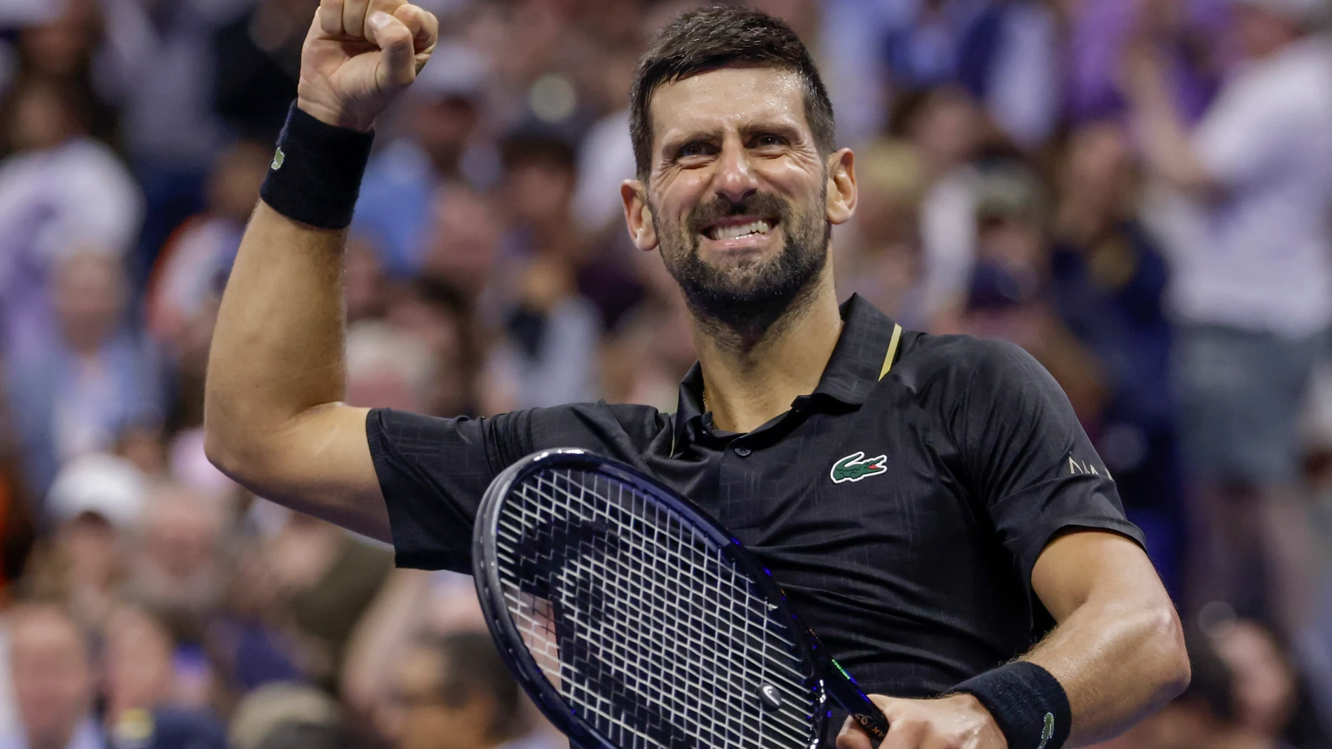 Novak Djokovic, of Serbia, reacts after defeating Jan-Lennard Struff, of Germany, during the fourth round of the US Open tennis championships, Sunday, Aug. 31, 2025, in New York. (AP Photo/Adam Hunger)