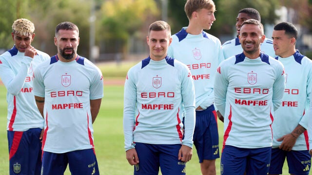 Carvajal, junto a De Frutos, en el entrenamiento de España