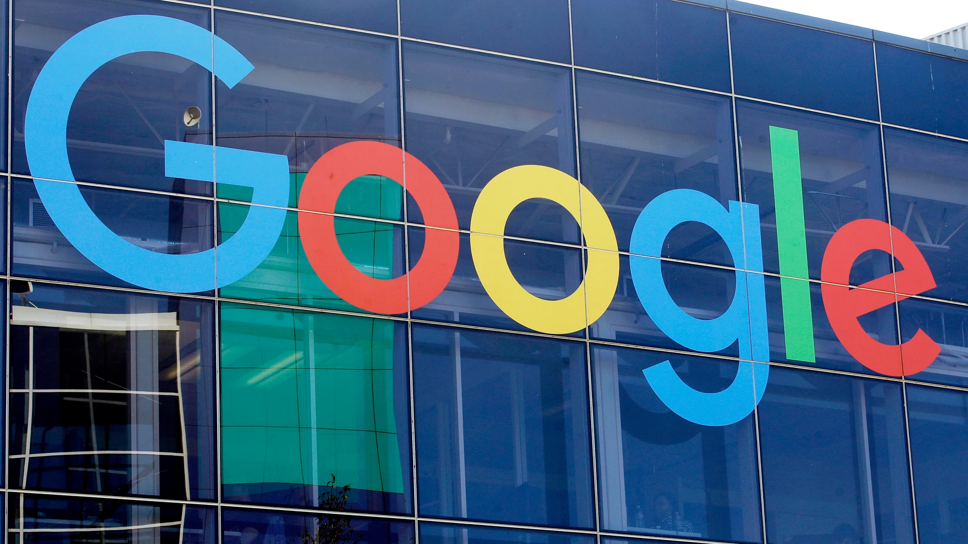 FILE - A sign is displayed on a Google building at their campus in Mountain View, Calif., Sept. 24, 2019. (AP Photo/Jeff Chiu, File)
