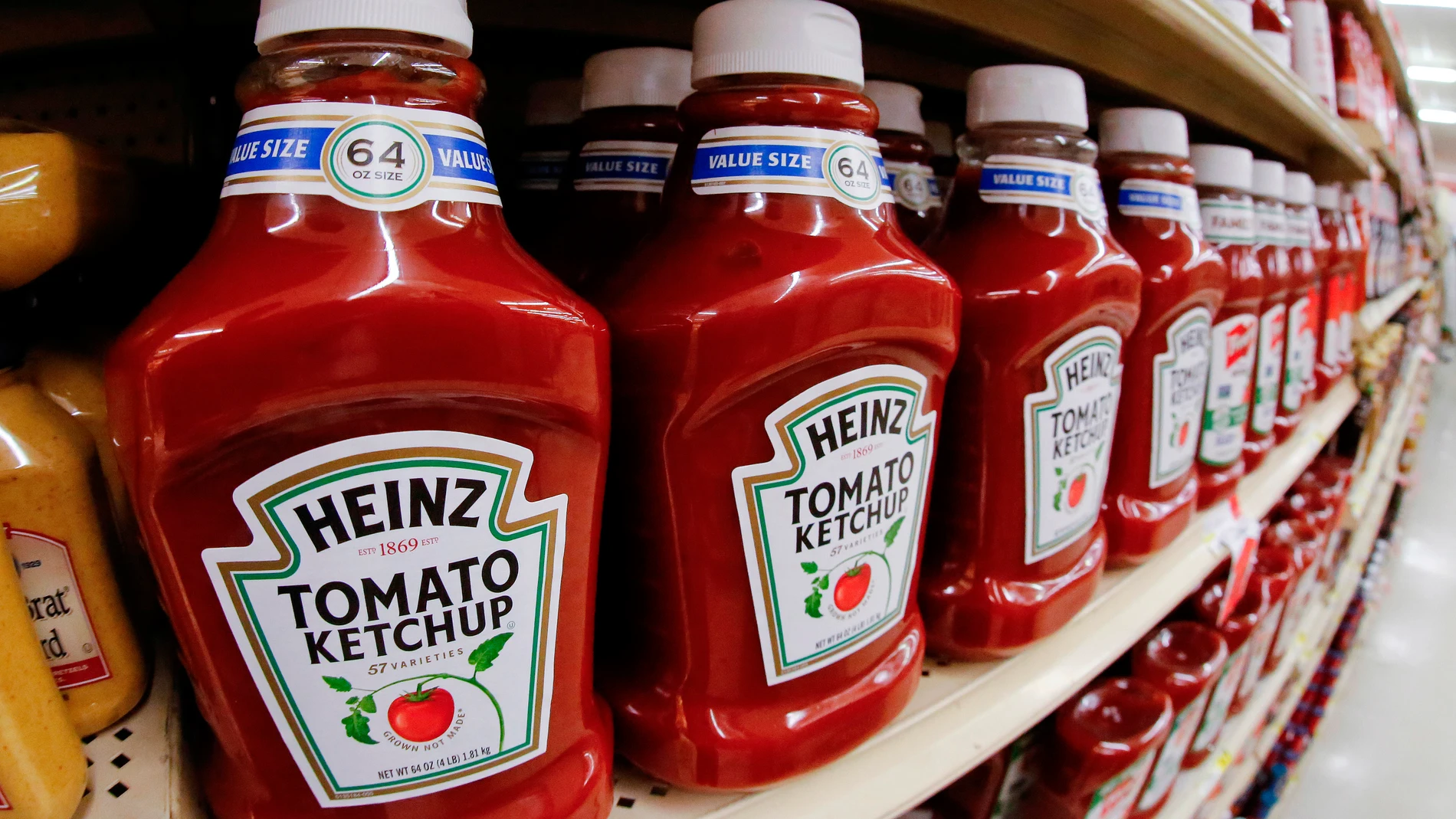 FILE- This Feb. 21, 2018, file photo shows a display of Heinz Ketchup on display in a market in Pittsburgh. (AP Photo/Gene J. Puskar, File)